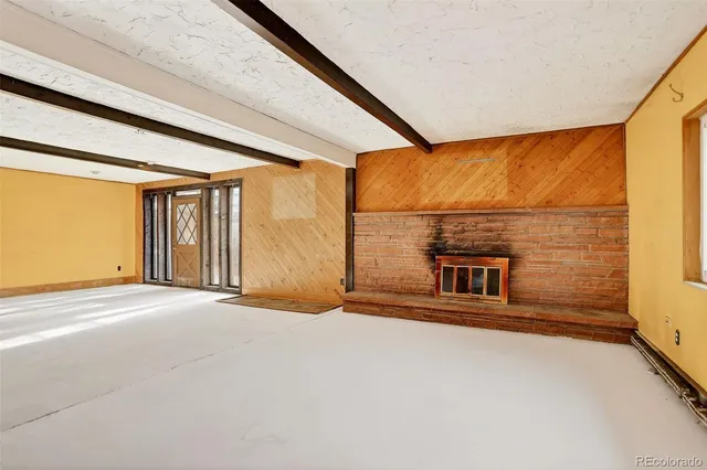 a kitchen with stainless steel appliances granite countertop a sink and a stove