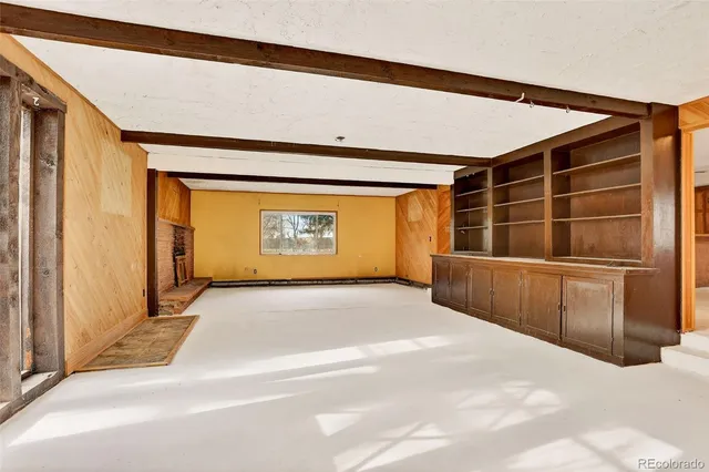 a kitchen with stainless steel appliances a sink a stove and a refrigerator