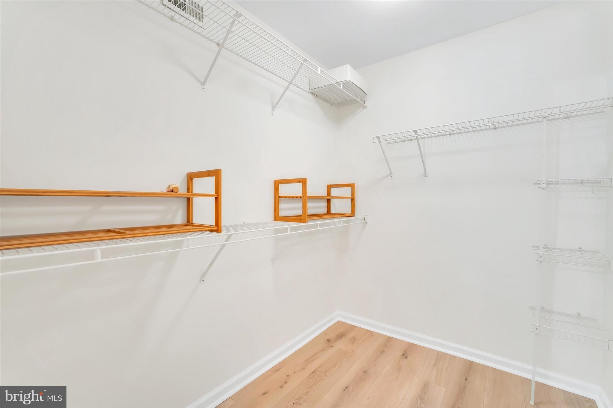 1516 North Point Drive, Unit 1 Reston, VA 20194 - Photo 25 of 32 Spacious Primary Walk-in Closet
