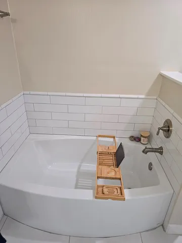 a bathroom with a bathtub