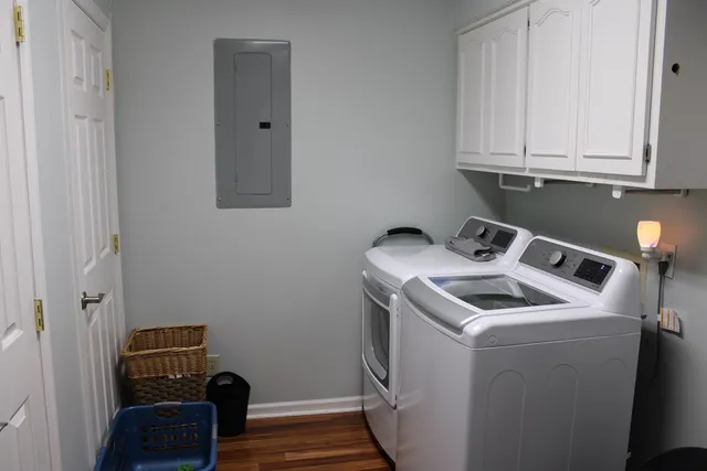 a utility room with dryer and washer