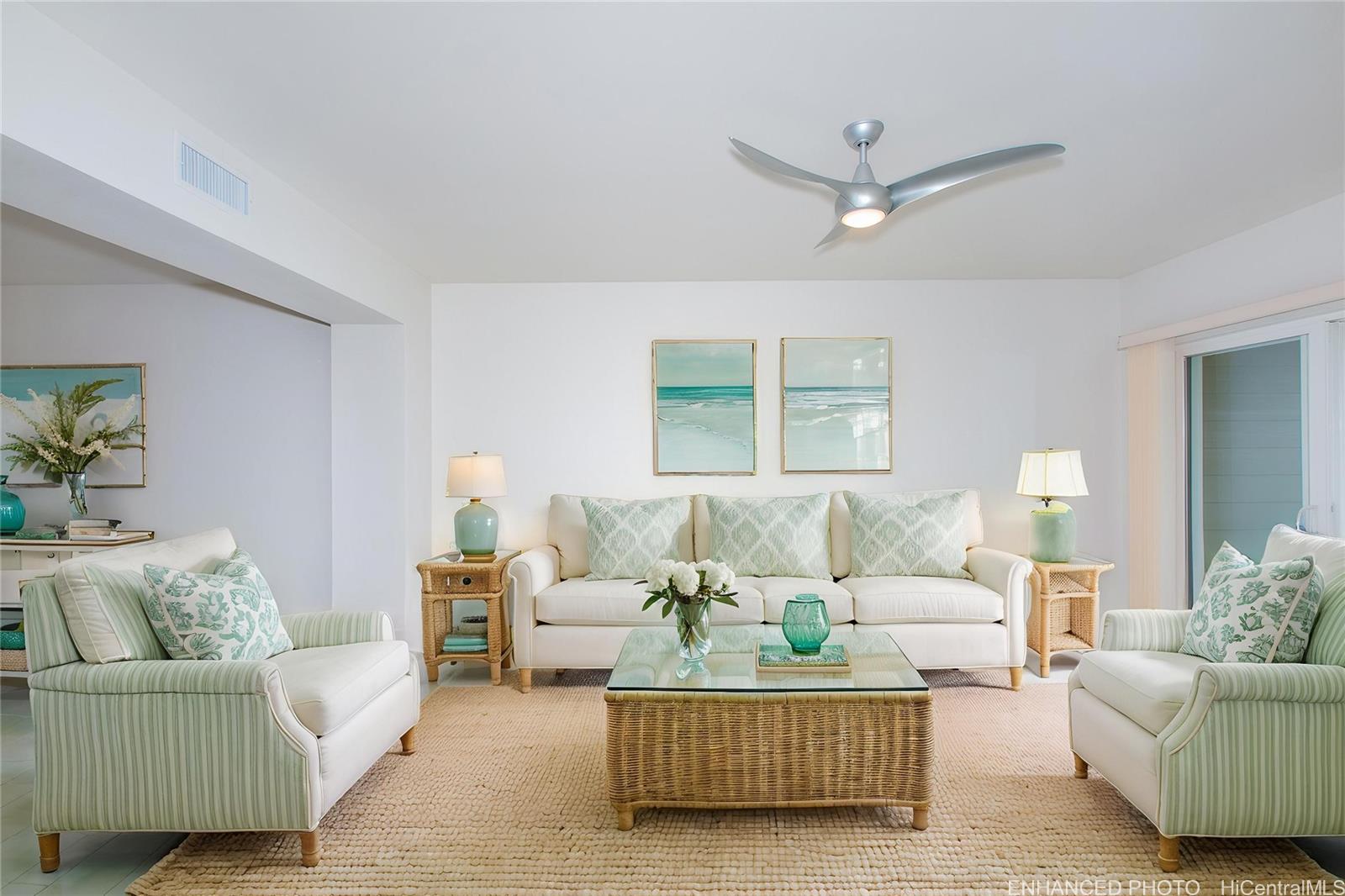 437 Kailua Road, Unit 6206 Kailua, HI 96734 - Photo 1 of 1 a living room with furniture and a large window