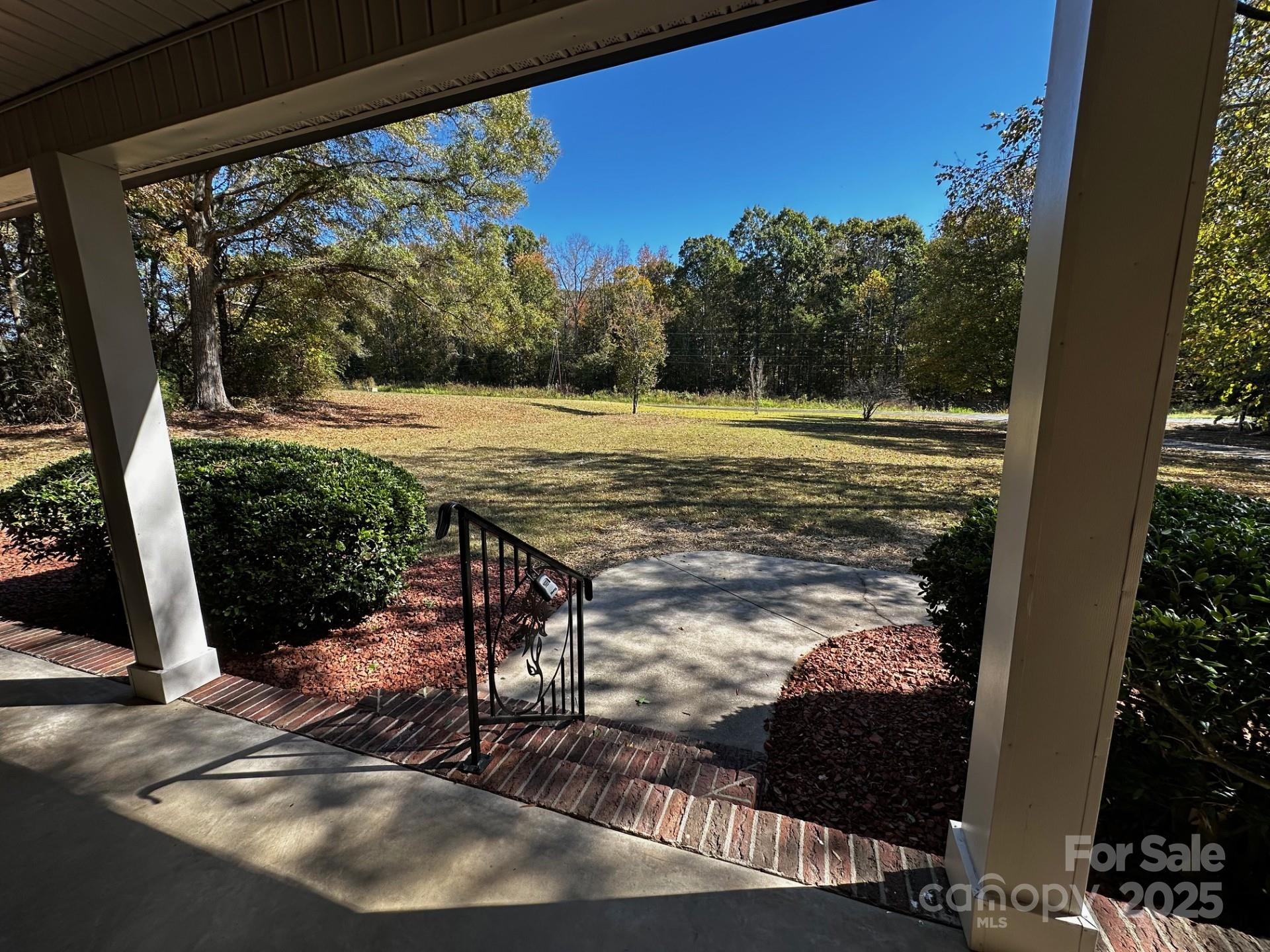 1080 Gin Road Rockwell, NC 28138 - Photo 34 of 34 a view of a swimming pool with a patio