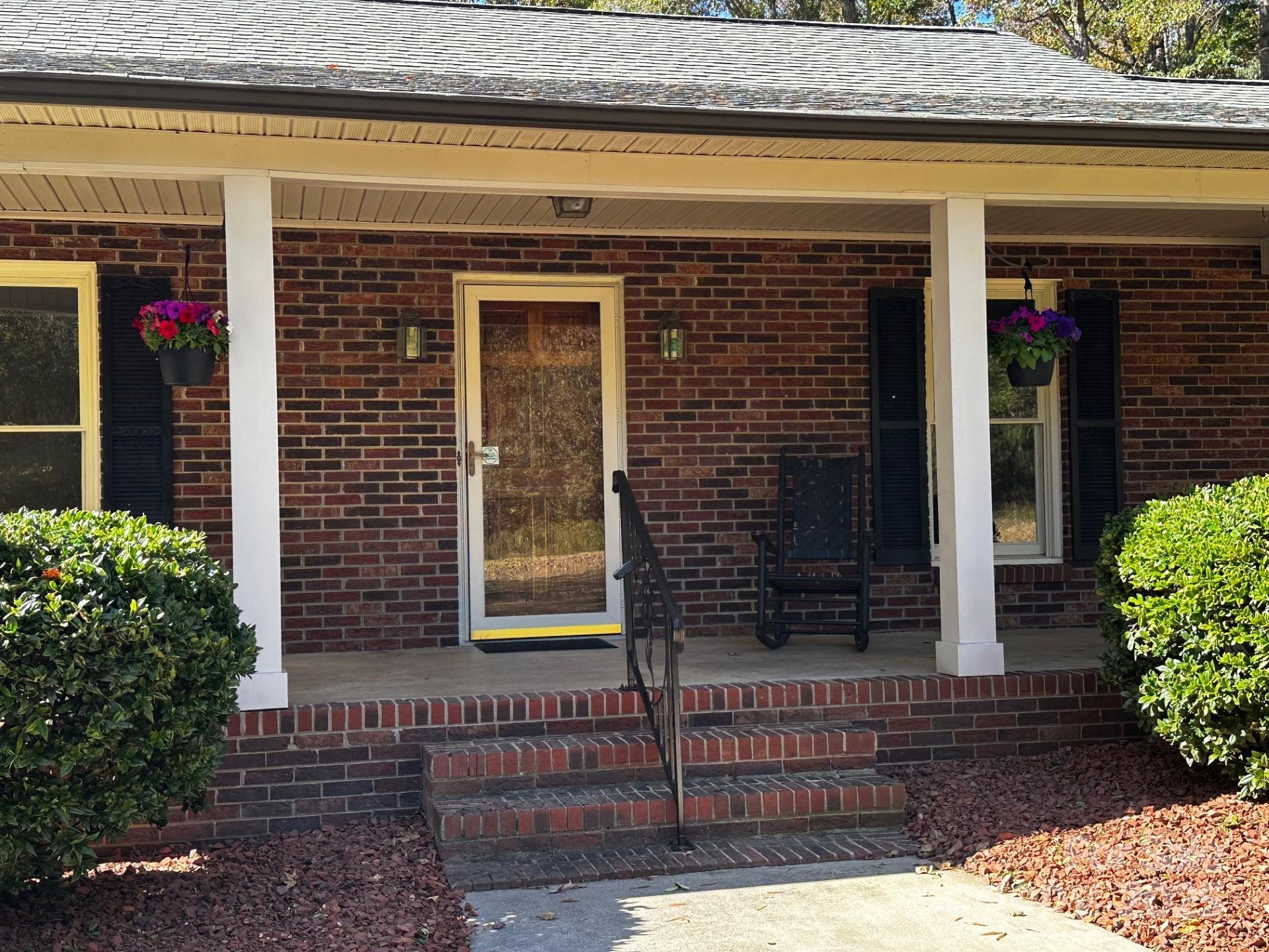 1080 Gin Road Rockwell, NC 28138 - Photo 5 of 34 a front view of a house with entryway