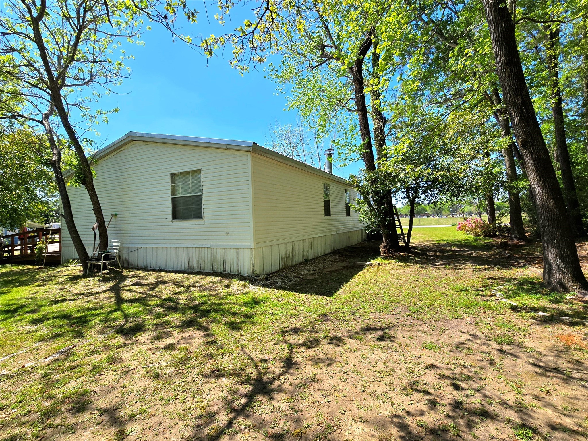 620 Easy Street Cleveland, TX 77327 - Photo 11 of 26 a backyard of a house