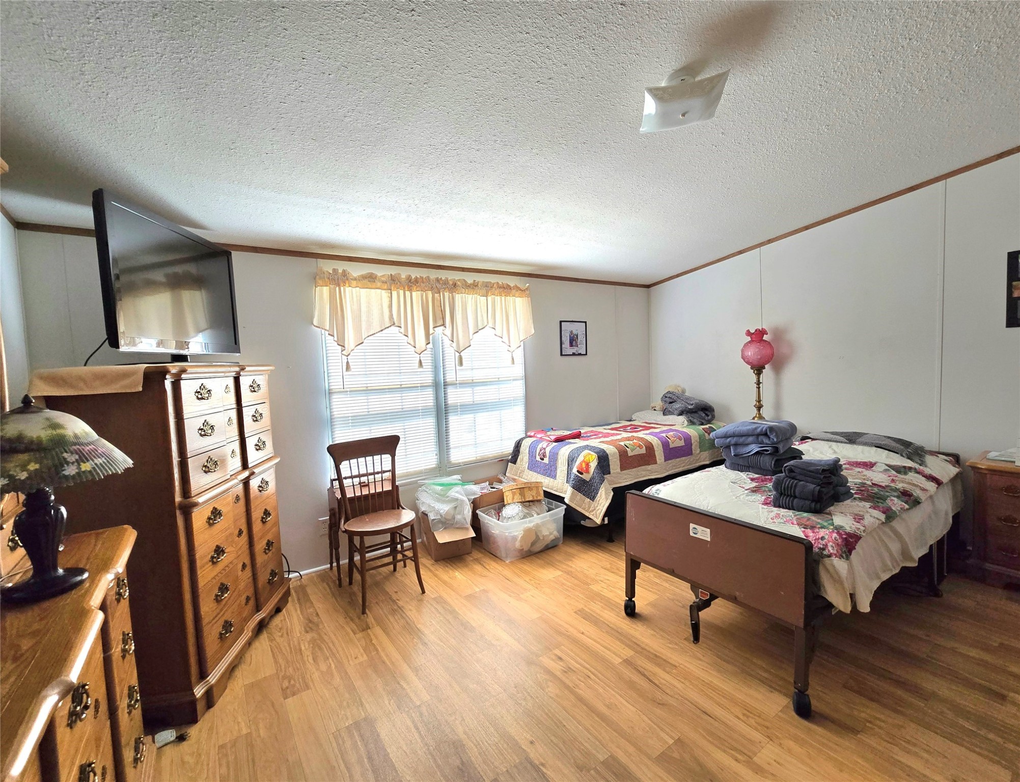 620 Easy Street Cleveland, TX 77327 - Photo 14 of 26 a living room with furniture and a window
