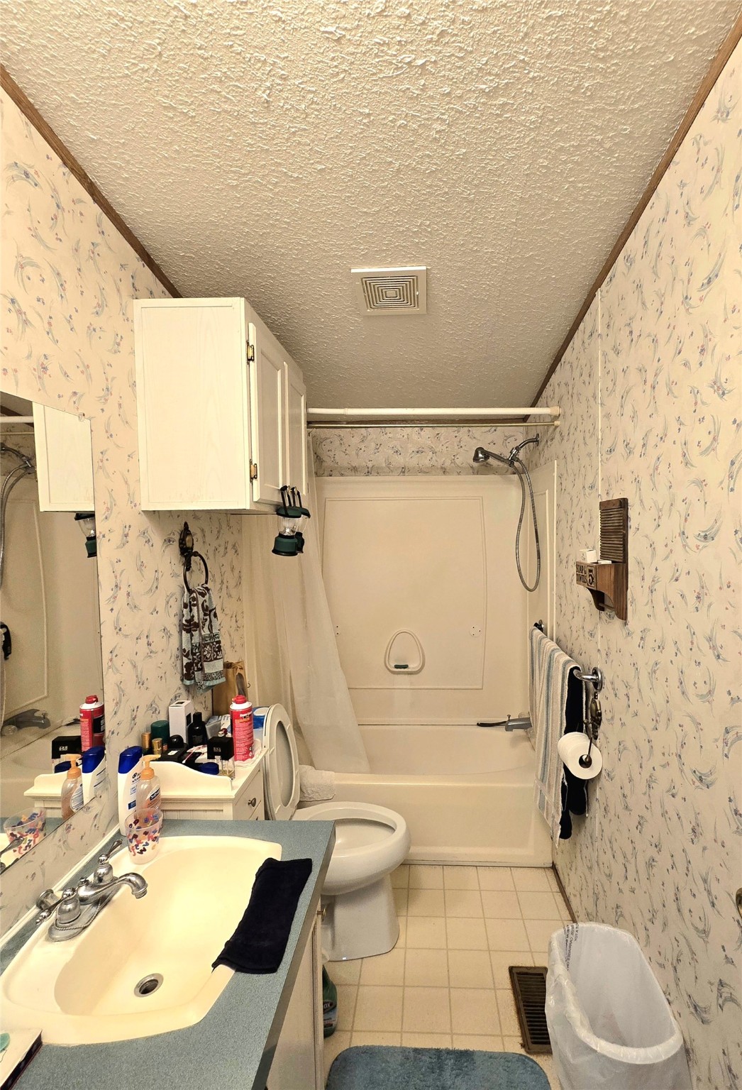 620 Easy Street Cleveland, TX 77327 - Photo 17 of 26 a bathroom with a sink toilet and shower