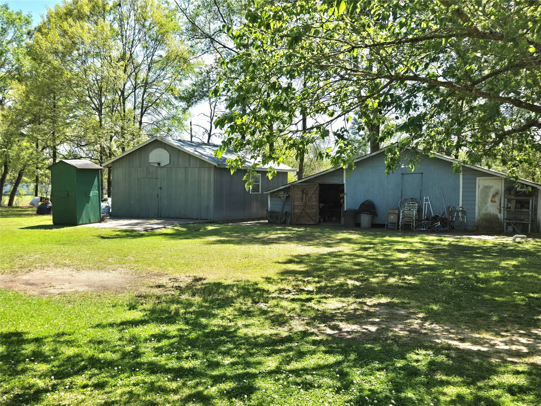 620 Easy Street Cleveland, TX 77327 - Photo 18 of 26 a house view with a swimming pool