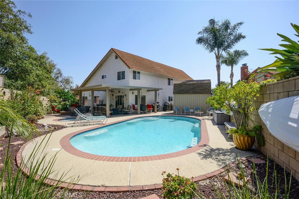10424 Cartilla Court Rancho Cucamonga, CA 91737 - Photo 31 of 36 a view of a house with swimming pool and sitting area