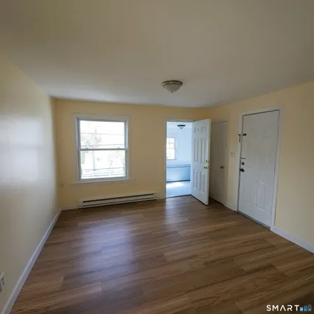 wooden floor and window in a room