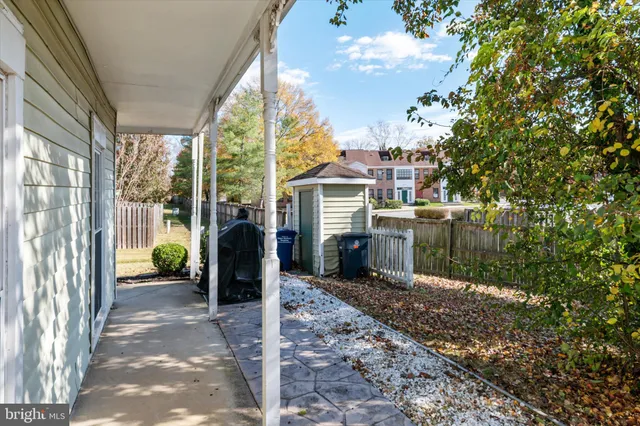 a view of a car park in front of house