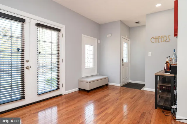 a view of a livingroom with furniture and wooden floor