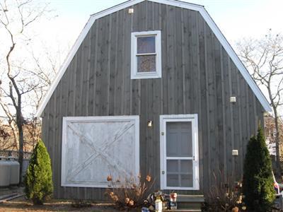 1 18th Street South, Unit 12 Edgartown, MA 02539 - Photo 2 of 5 a backyard of a house
