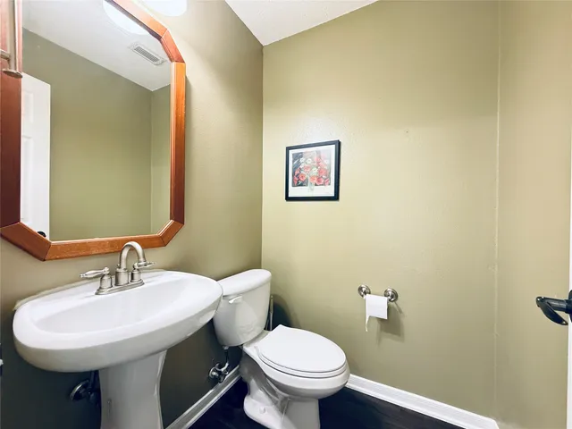 a bathroom with a sink and a toilet
