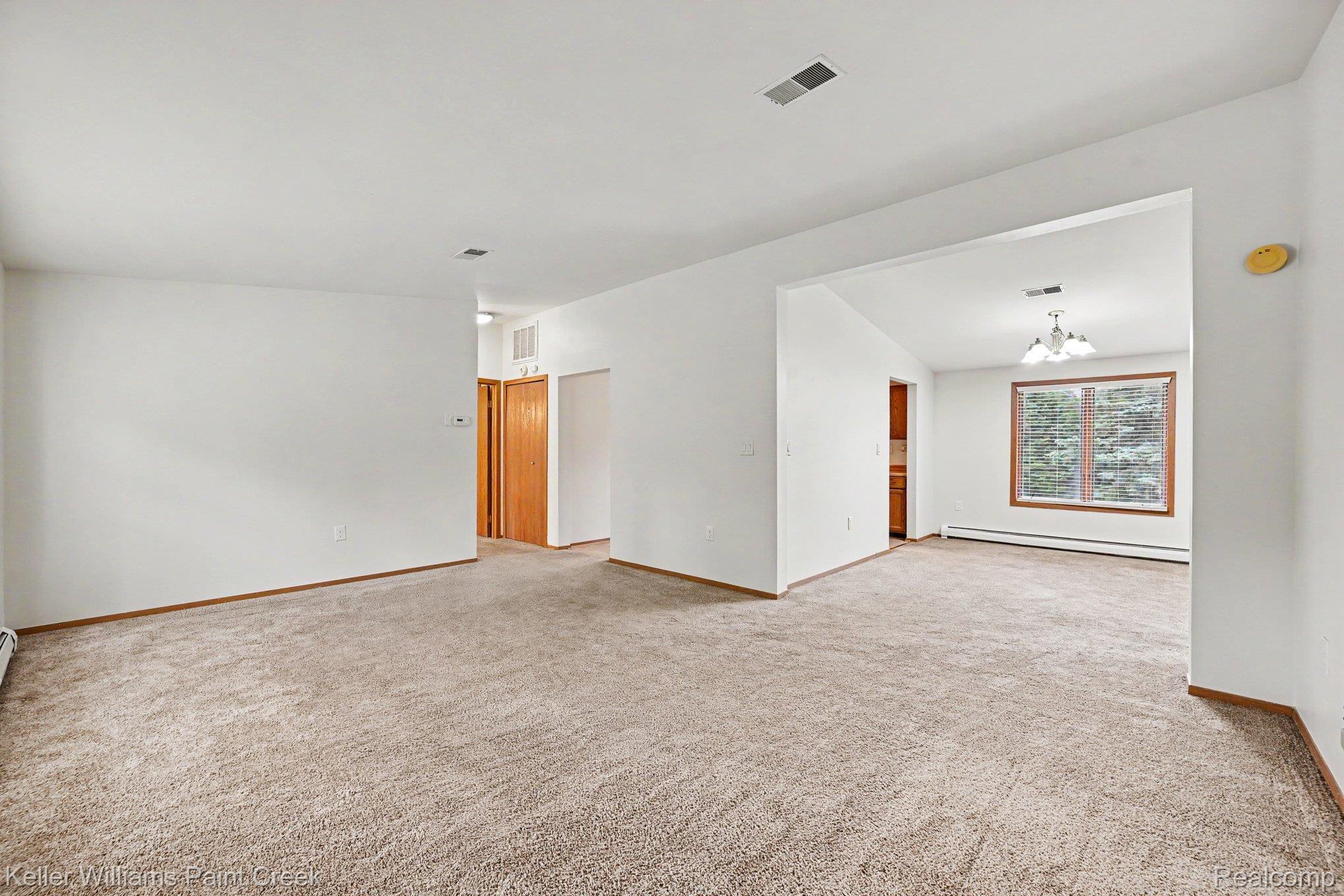 2232 London Bridge Drive Rochester, MI 48307 - Photo 7 of 26 Neutral tone carpeting