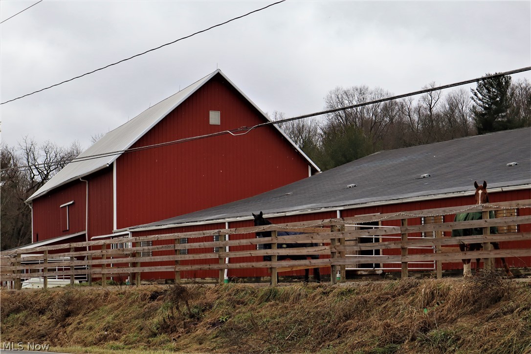 8544 River Styx Road Wadsworth, OH 44281 - Photo 4 of 35 1840s bank barn and equestrian facility, street view