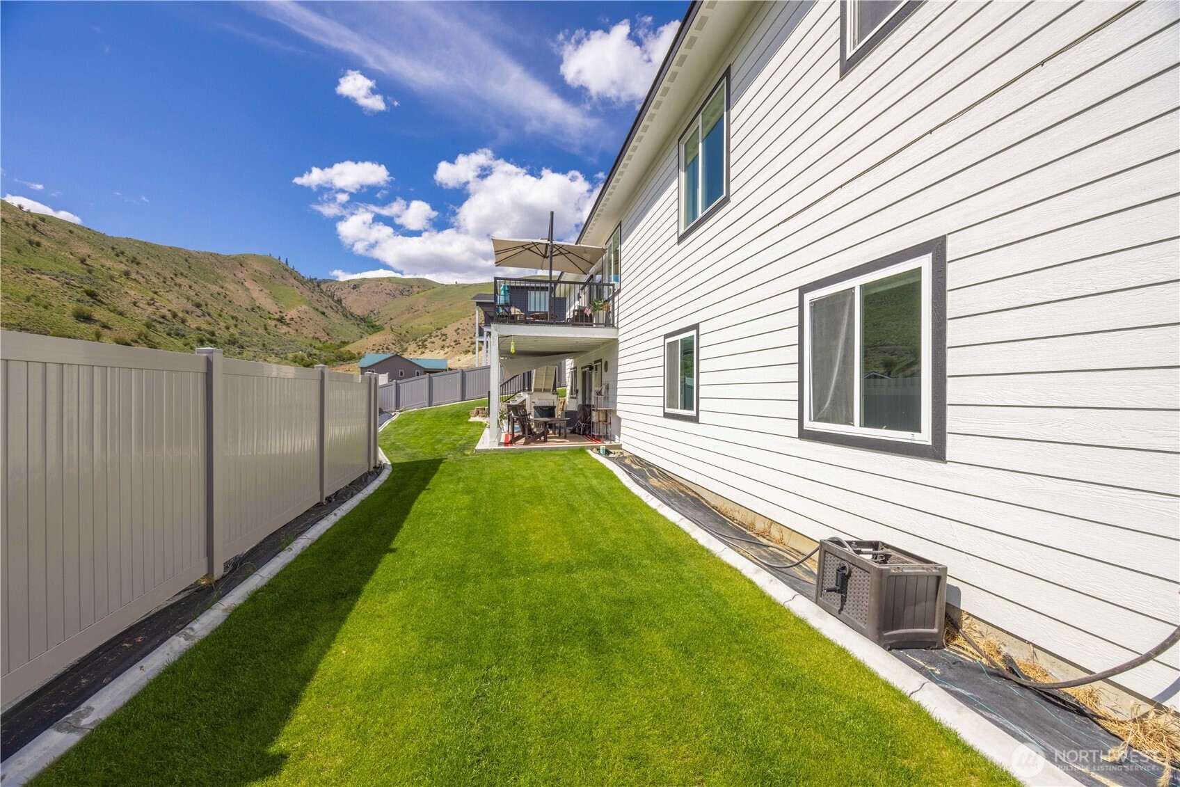 9968 Griffith Place Entiat, WA 98822 - Photo 32 of 38 a view of a house with a backyard