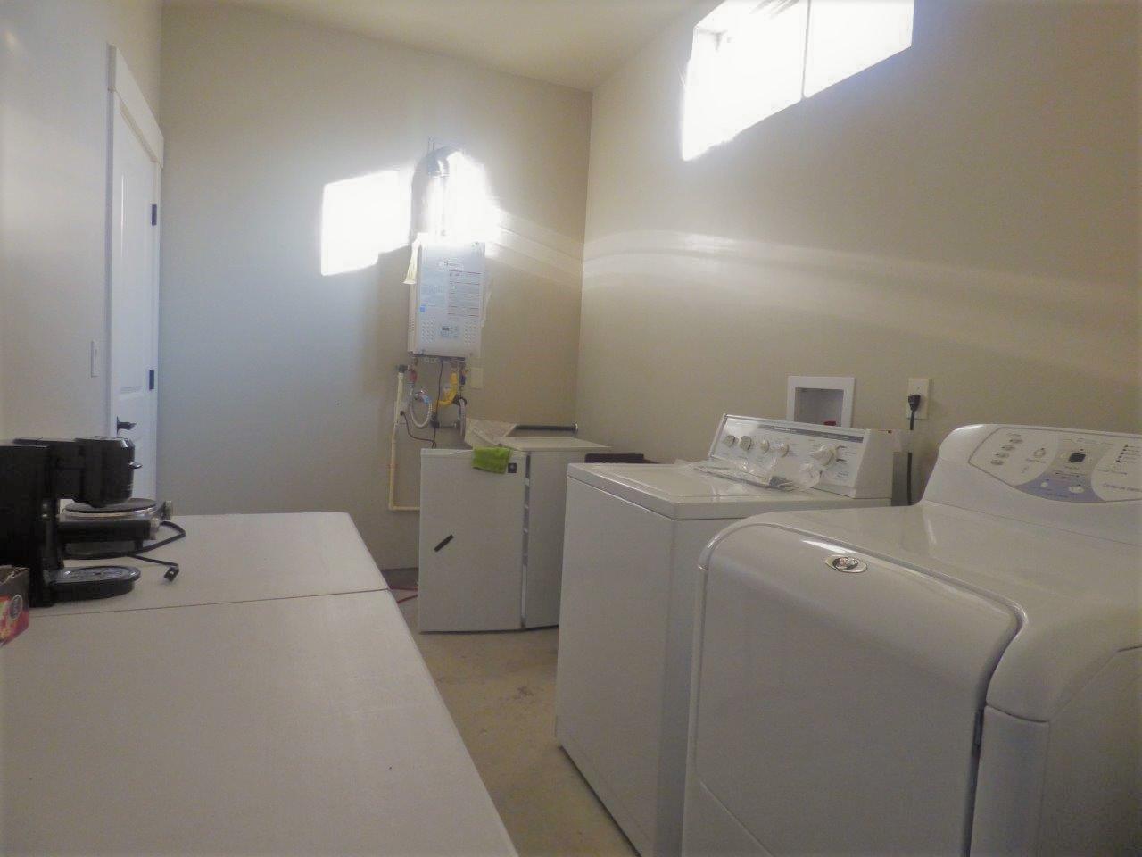 2144 Southwest Allen Creek Road Grants Pass, OR 97527 - Photo 47 of 55 Laundry area and area for a kitchenette, if desired, is downstairs from the studio guest quarters.
