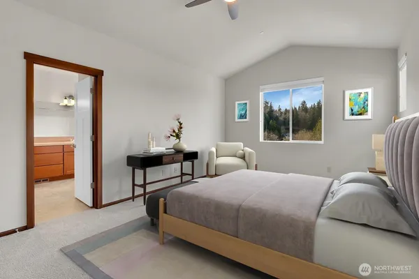 a bedroom with a bed and a couch