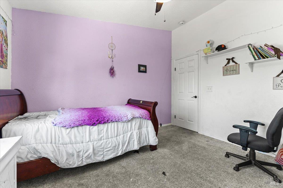 4457 Graywhaler Lane Rohnert Park, CA 94928 - Photo 22 of 51 a bedroom with a bed and a chair
