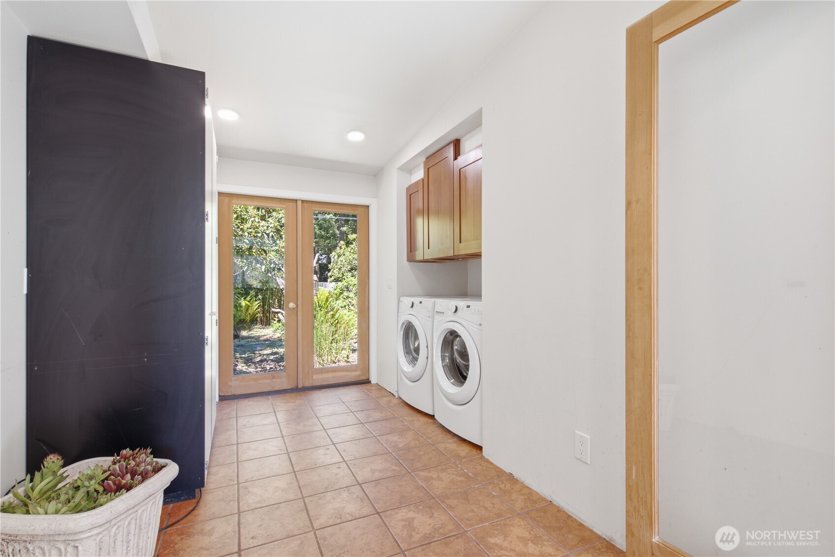 3050 Southeast Mullenix Road Port Orchard, WA 98367 - Photo 26 of 40 a view of a storage & utility room with a sink
