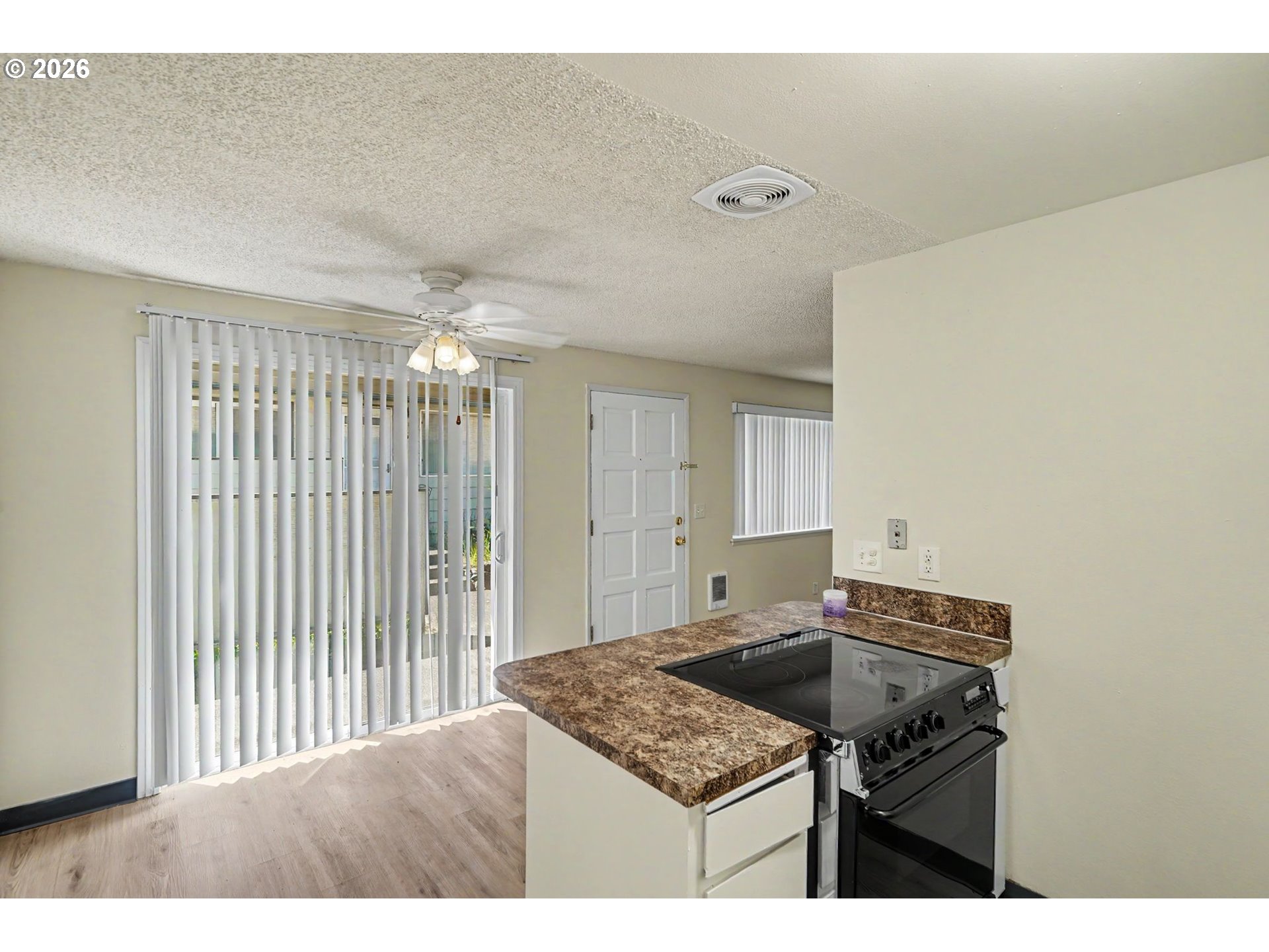 777 Boone Road Southeast, Unit 12 Salem, OR 97302 - Photo 10 of 16 a kitchen with a sink a stove and cabinets