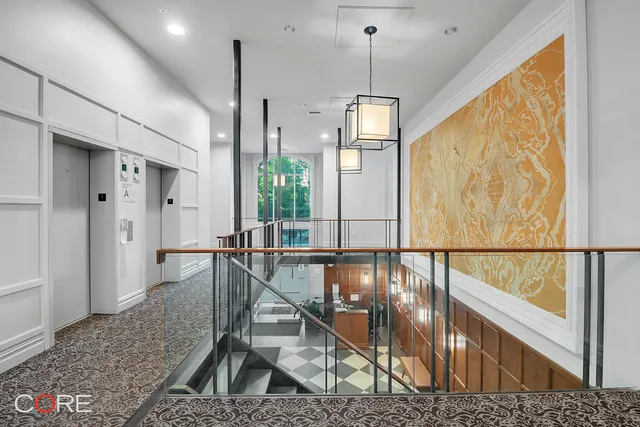 a view of a livingroom with furniture and window