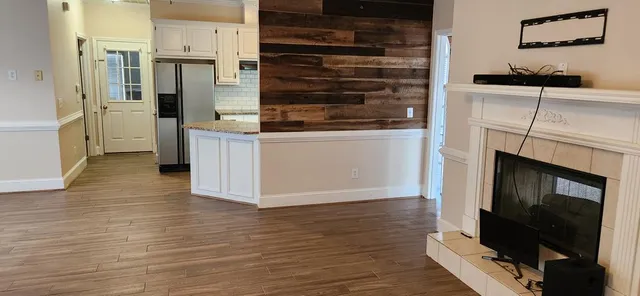 a kitchen with stainless steel appliances a stove and a refrigerator