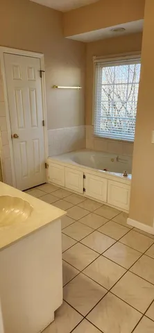 a view of a kitchen space with wooden floor