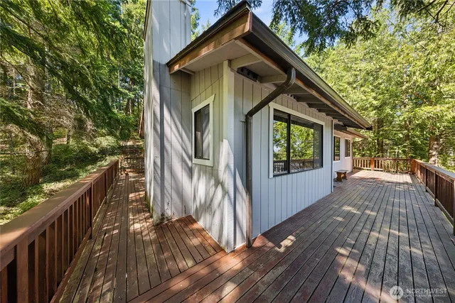 a house view with a wooden floor and outdoor space