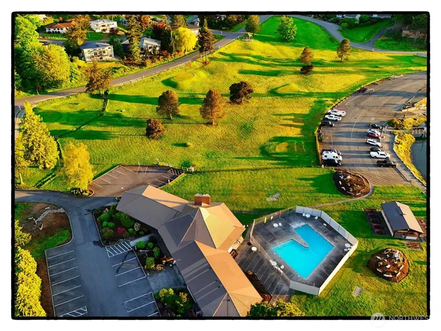 an aerial view of a house with a garden