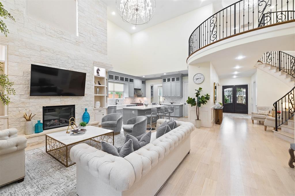 The soaring ceilings in this home add to it's spacious feel, and the open concept is great for entertaining with friends and family!