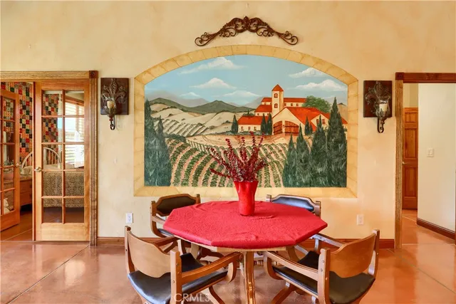 a kitchen with a sink and a view of living room