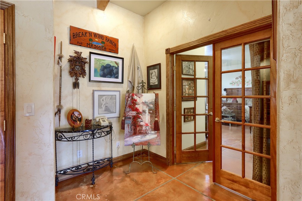 1087 Ben Hur Road Raymond, CA 93653 - Photo 24 of 75 a view of an entryway with wooden floor