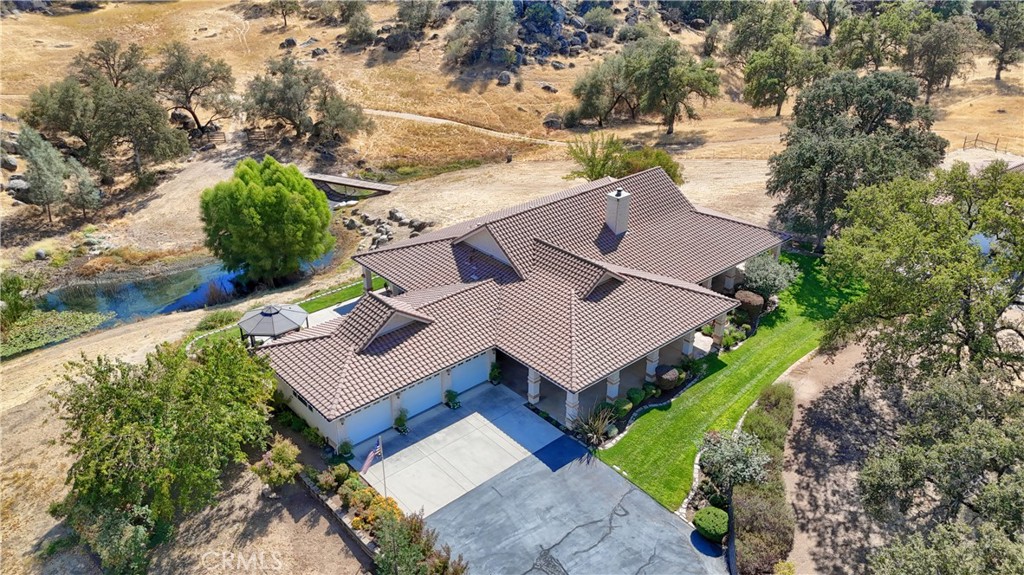 1087 Ben Hur Road Raymond, CA 93653 - Photo 50 of 75 an aerial view of a house with a yard