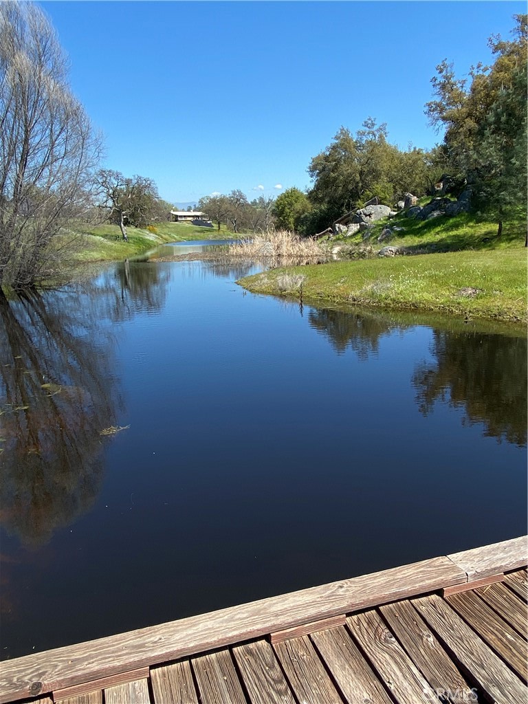1087 Ben Hur Road Raymond, CA 93653 - Photo 5 of 75 a view of a lake from a balcony