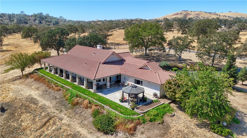 1087 Ben Hur Road Raymond, CA 93653 - Photo 51 of 75 an aerial view of a house with a big yard