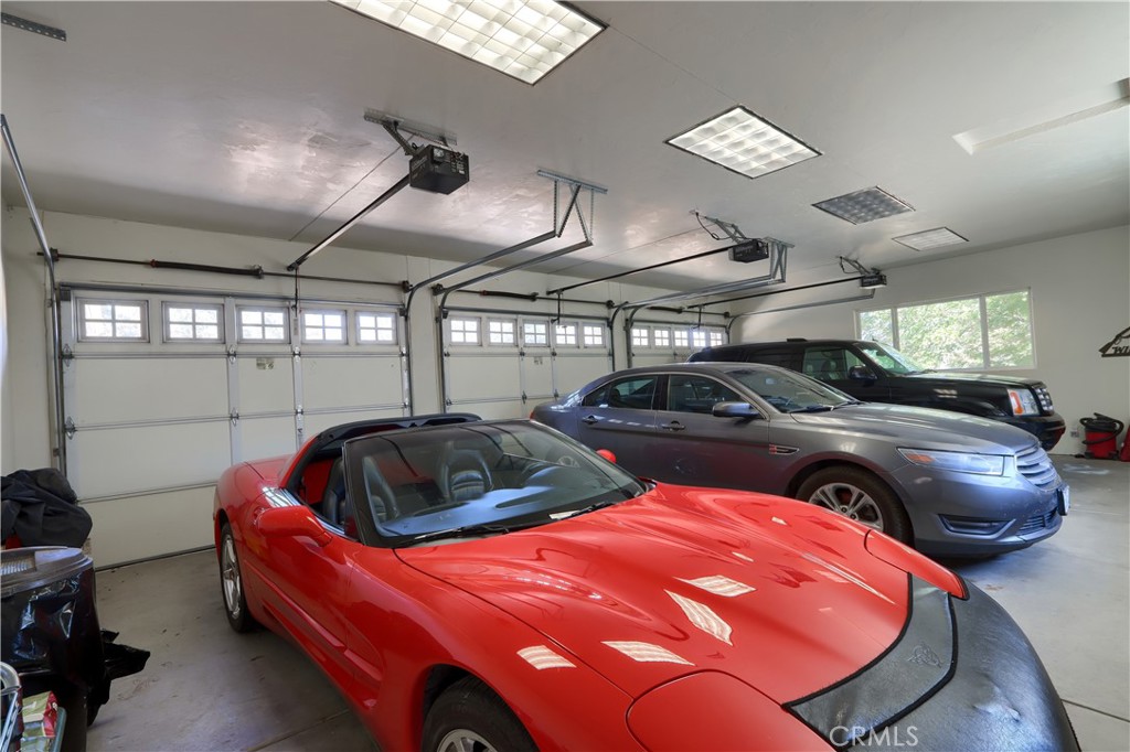1087 Ben Hur Road Raymond, CA 93653 - Photo 57 of 75 a car parked in a parking garage