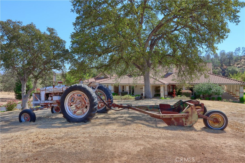 1087 Ben Hur Road Raymond, CA 93653 - Photo 69 of 75 a view of car parked in a yard