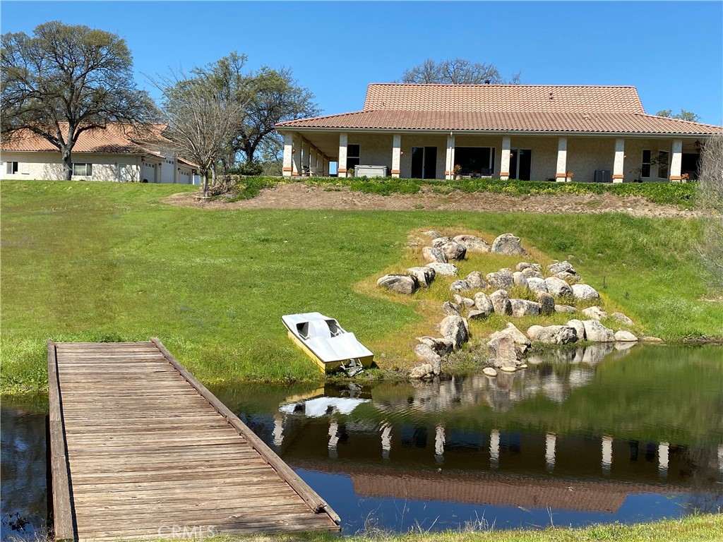 1087 Ben Hur Road Raymond, CA 93653 - Photo 7 of 75 a front view of a house with garden
