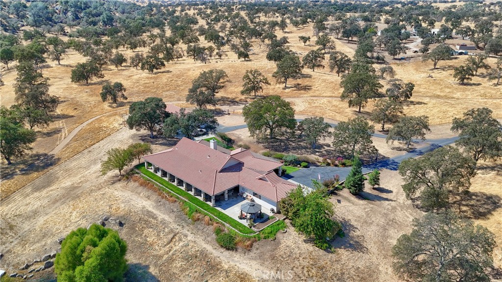 1087 Ben Hur Road Raymond, CA 93653 - Photo 9 of 75 an aerial view of a house with a yard