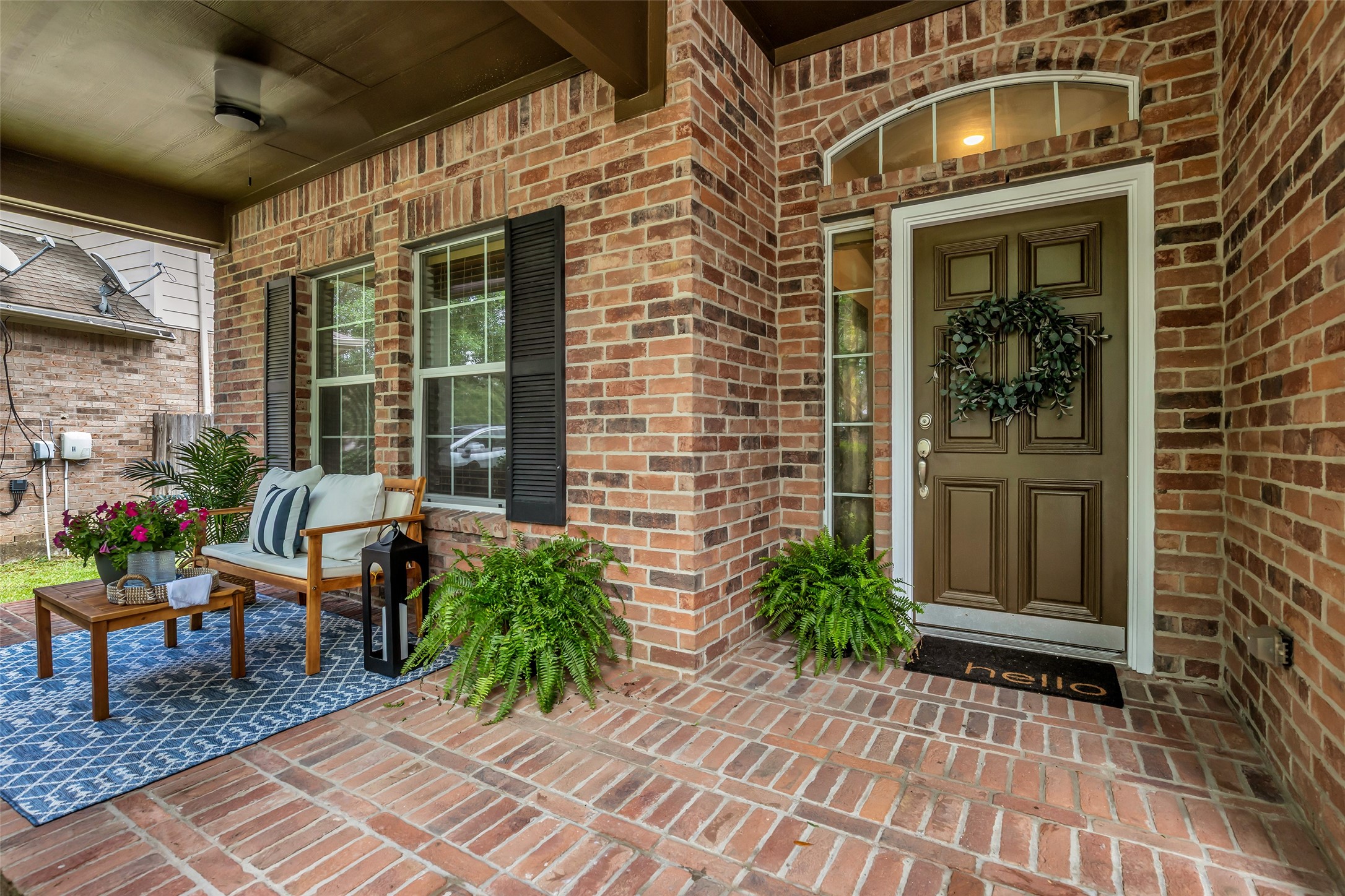 a view of a porch with seating space