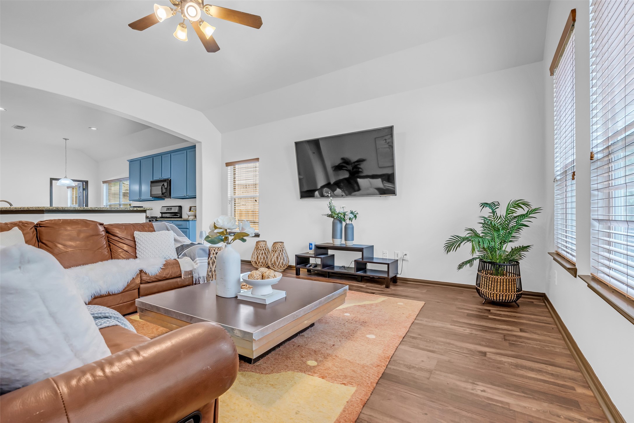 134 South Star Ridge Circle The Woodlands, TX 77382 - Photo 13 of 29 a living room with furniture and a flat screen tv