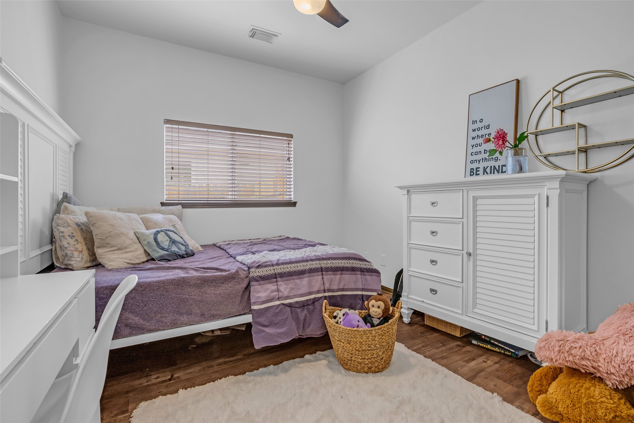 134 South Star Ridge Circle The Woodlands, TX 77382 - Photo 19 of 29 a bedroom with a bed and cabinets