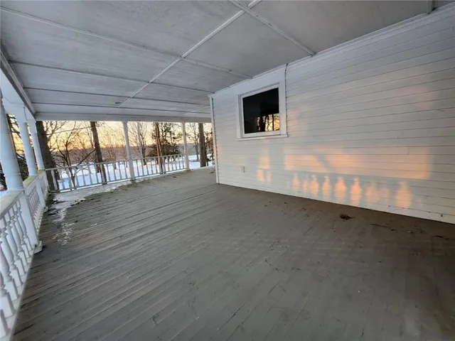 a view of a yard with a tree