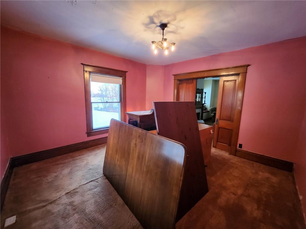 364 Kinsman Road Jamestown, PA 16134 - Photo 14 of 22 a living room with furniture and a chandelier