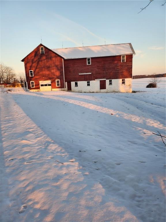 364 Kinsman Road Jamestown, PA 16134 - Photo 3 of 22 a car parked on the side of the road