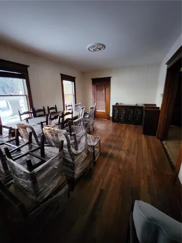 a view of a livingroom with furniture and front door