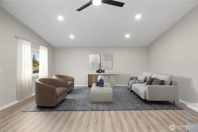 a living room with furniture and a window