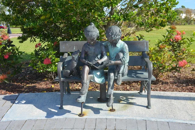 a vase of flowers sitting on a table